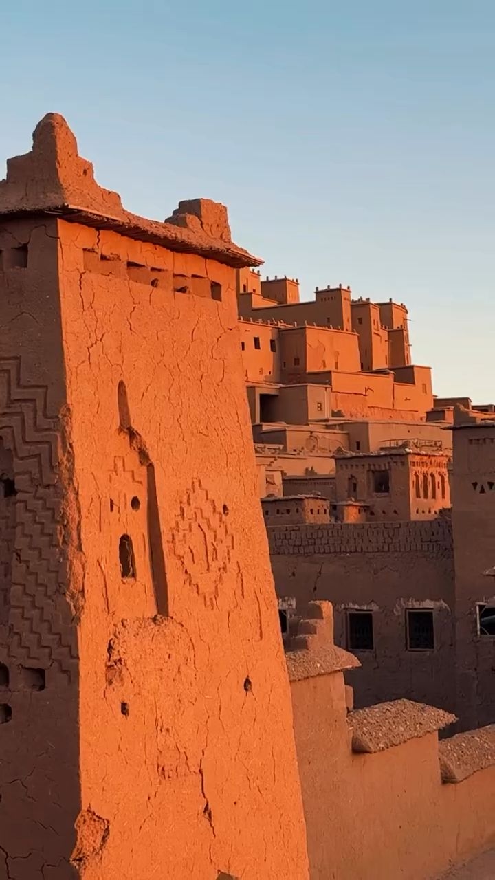 The earthen towers of the ksar of Aït Ben Haddou rising above the palm groves